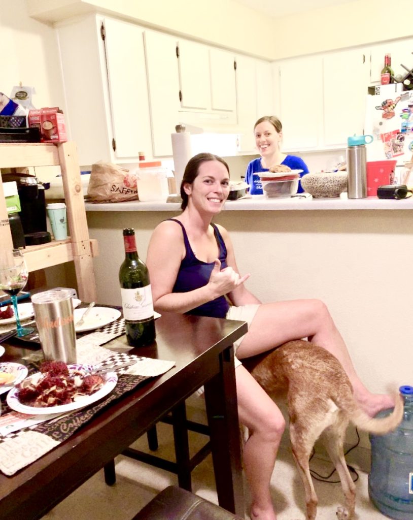 Friends Ashley and Leslie prepping for an evening of wine pairings.